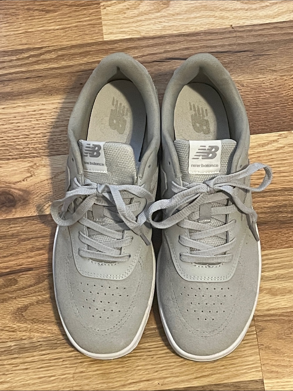 New Balance Men’s Light Gray Suede Sneakers